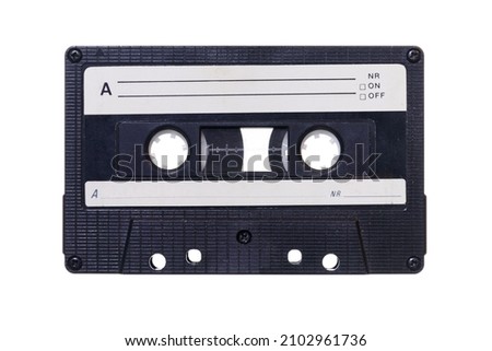 Old vintage audio cassette isolated on white background. Retro analog hifi music concept. Royalty-Free Stock Photo #2102961736