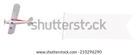 Single engine plane flying with blank banner isolated on a white background