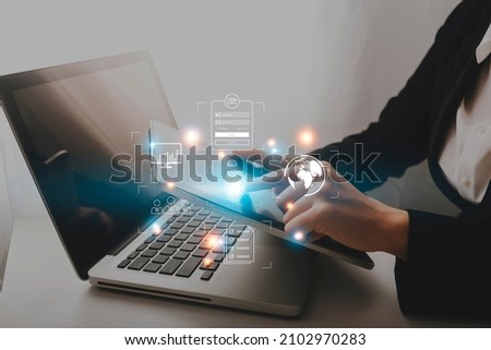 Cybersecurity and privacy concepts to protect data. Lock icon and internet network security technology. Businessman protecting personal data on smart phone with virtual screen interfaces. Royalty-Free Stock Photo #2102970283