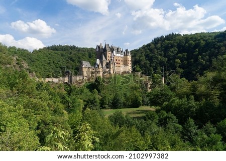 A Beautiful view of famous Eltz Castle on a sunny day, Wierschem, Rheinland-Pfalz, Germany Royalty-Free Stock Photo #2102997382