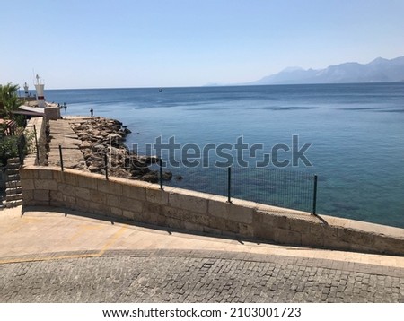 View from the embankment to the sea and mountains. Gagra, Abkhazia.