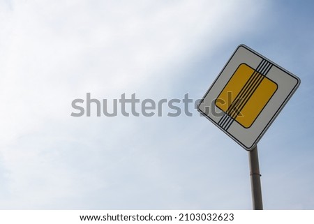 warning road sign on a pole