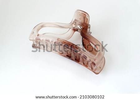jaws clip on isolated white background. hair clip. claw clips Royalty-Free Stock Photo #2103080102