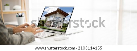 Online Real Estate House Property Search On Laptop