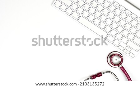 medical stethoscope on laptop keyboard. computer diagnostics or e-health concept	                                 
