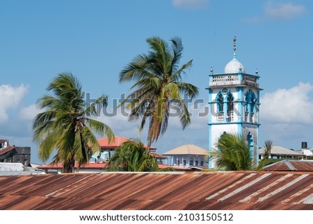 View over the Zanzibar capital's Stone town area. Old colonial era buildings. Churches, towers, restaurants and etc. African architecture at its finest. Sunny summer day on a paradise island