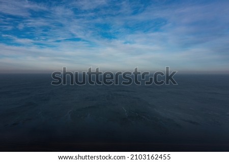 Horizon of the sea. Winter sky over sea Royalty-Free Stock Photo #2103162455
