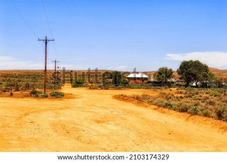 OUtskirts of Silverton ghost town in original australian outback - historic mining town with rare habitated houses in dry desert cimate. Royalty-Free Stock Photo #2103174329