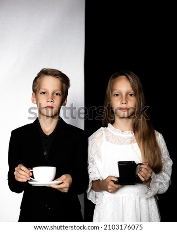 contrasting portrait of a girl and a boy