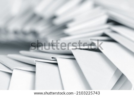 White origami background, abstract parametric spiral structure, close up photo with selective focus