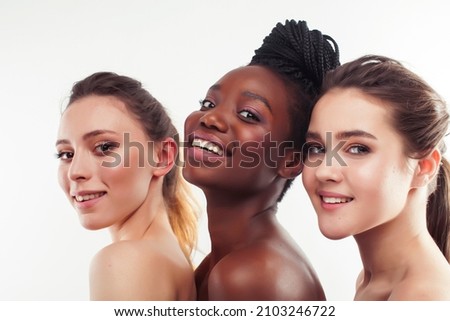 three different nation woman: african-american, caucasian together isolated on white background happy smiling, diverse type on skin, lifestyle real people concept close up