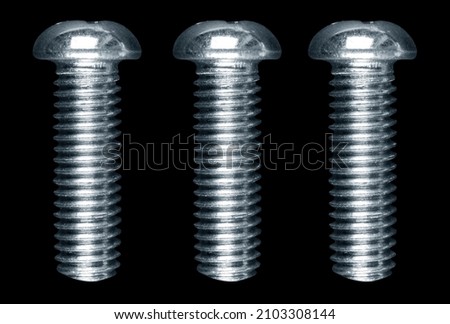 Macro shot metal bolt isolated on black background. Chromed screw bolt isolated. Steel bolt isolated. Nuts and bolts. Tools for work.