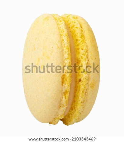Yellow macaroon isolated on white background. Clipping path