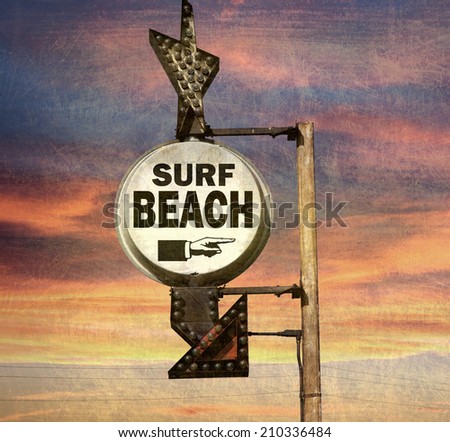 aged and worn vintage photo of surf beach sign with sunset                            