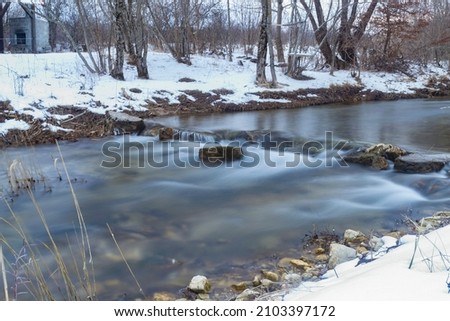 Long exposure photo of Otuča river in a winter. Croatian wilderness
