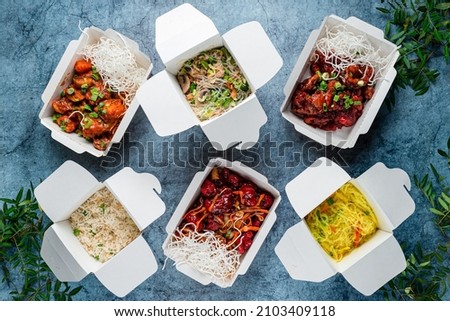 set of Chinese noodles in craft paper food containers top view, Various Chinese food in take-out box, flat lay. Healthy food delivery