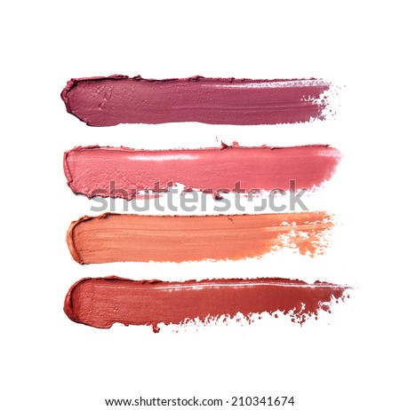 Collection of smudged lipsticks isolated on white 