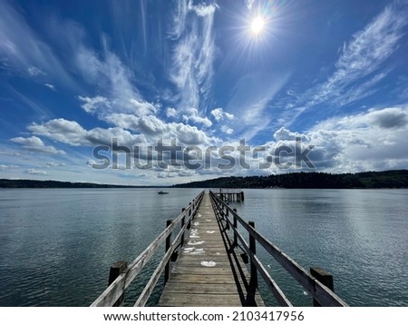 Pier view on Bainbridge Island, Washington. Royalty-Free Stock Photo #2103417956