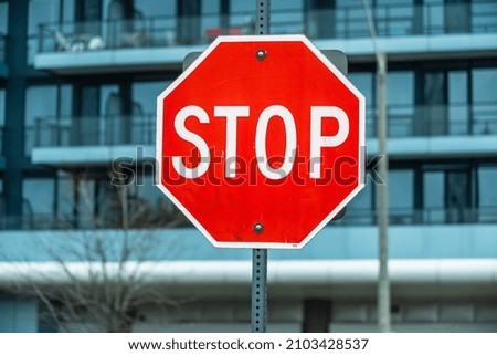 A red stop sign in Toronto.