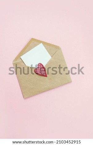 Valentine's day background. open envelope with blank note. Moke up. Flat lay
