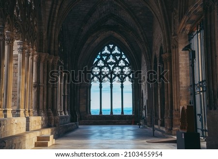 Interior of a gothic church with incredible views to the mountains. Royalty-Free Stock Photo #2103455954
