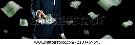 Rich man holding Europe money. Cash Euro bill flying banner. Euro money background