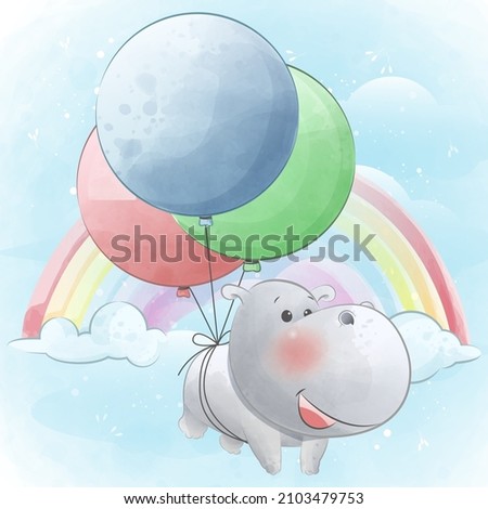 
Cute little hippopotamus flying with balloons