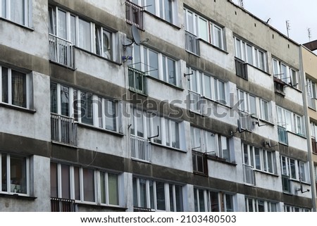 Old dilapidated residential buildings in eastern europe. Royalty-Free Stock Photo #2103480503