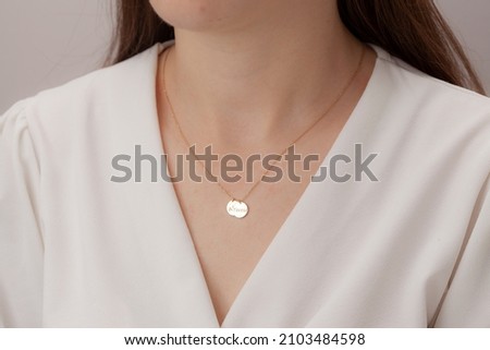 Silver necklace on woman. Jewelry images that can be used in e-commerce, online sales and social media.