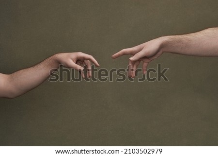 Creation of Adam Hands Inspired Photo Royalty-Free Stock Photo #2103502979