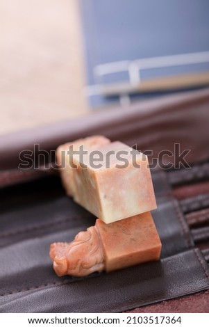 Blank seal stones on various carving knives