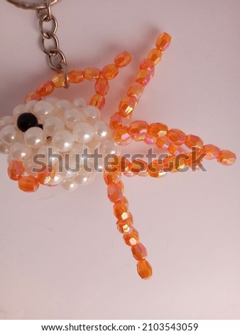 fish shape keychain made of beads