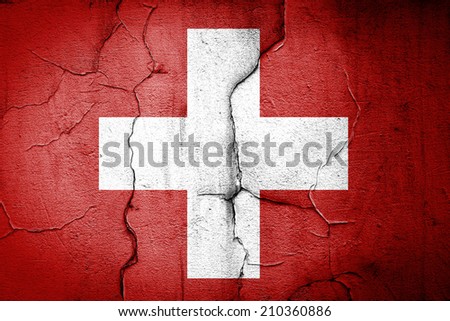 flag of Swiss painted on cracked wall