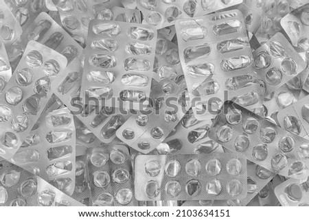 Pattern of empty pill blister packs. Medical blisters without pills. A course of treatment. Treatment concept. Pharmaceutical industry. Pharmacy.