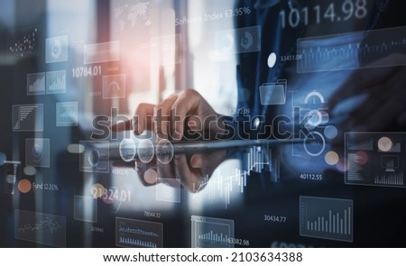 Business analytics, Business Intelligence, market research concept. Data scientist working on laptop with big data, financial graph performance, futuristic technology background Royalty-Free Stock Photo #2103634388