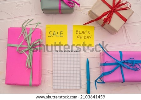 beautiful colored gifts laid out at a discount on a beautiful table. Black friday concept