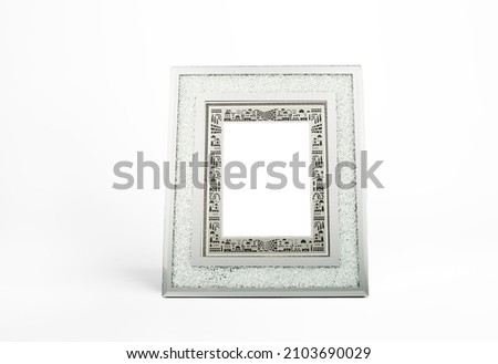 Blank shining silver picture frame on white background