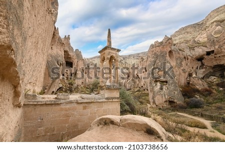 Zelve Open Air Museum in Goreme, Cappadocia, Turkey. Cave town and houses at rock formations. Royalty-Free Stock Photo #2103738656
