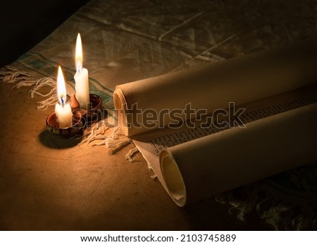 Grunge age dirty brown pray belief Moses law believe dark night wooden desk table space. Closeup judaic sacred church library prayer culture god Jesus Christ literary past art wood still life concept Royalty-Free Stock Photo #2103745889