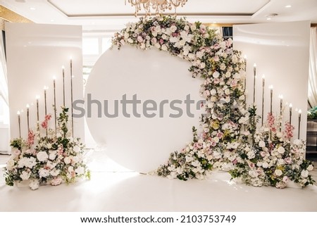 White floral backdrop for photo shoots with purple flowers 