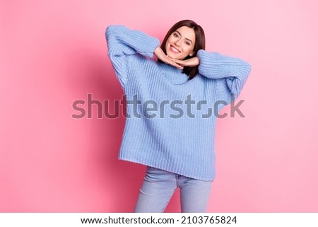 Portrait of attractive cute cheerful brown-haired girl posing good mood isolated over pink pastel color background