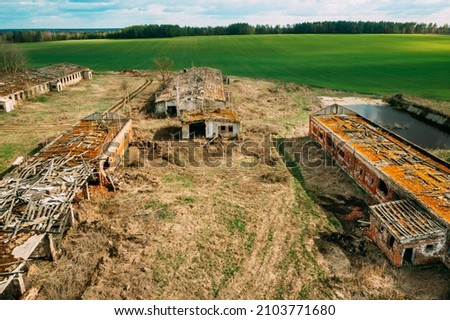 Belarus. Abandoned Barn, Shed, Cowsheds, Farm House In Chernobyl Resettlement Zone. Chornobyl Catastrophe Disasters. Dilapidated House In Belarusian Village. Whole Villages Must Be Disposed. Royalty-Free Stock Photo #2103771680