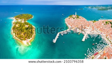 Town of Rovinj historic peninsula and Sveta Katarina island aerial view, famous tourist destination in Istria region of Croatia Royalty-Free Stock Photo #2103796358