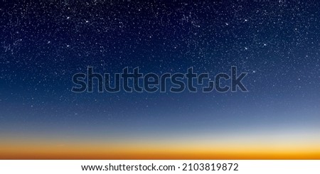 beautiful dawn of the sun with stars, gradient from blue to red Royalty-Free Stock Photo #2103819872