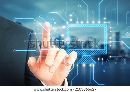 Close up of male hand pointing at abstract glowing computer monitor chip and circuit hologram on blurry night city background. Technology, information and internet concept. Double exposure