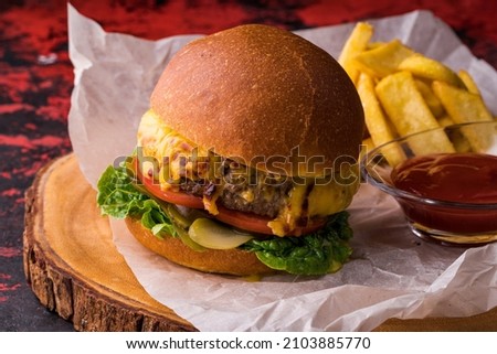 Delicious fresh sandwich with chicken burger, tomato, pickles, onions and lettuce. Free space for text