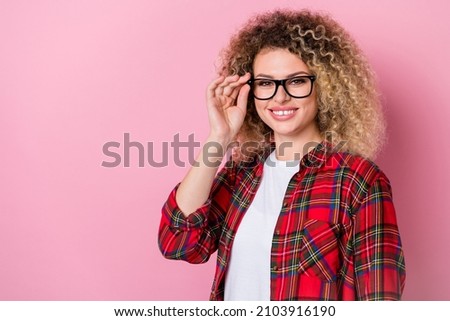 Photo of charming pretty smart lady look camera shiny smile wear eyewear plaid shirt isolated pink color background