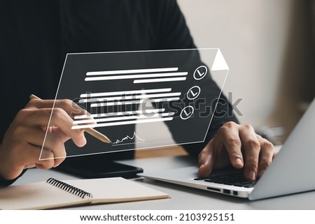 Electronic Signature Concept, Electronic Signing Businessman signs electronic documents on digital documents on virtual laptop screen using stylus pen. Royalty-Free Stock Photo #2103925151