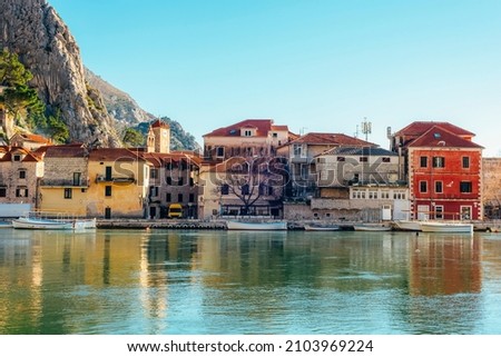 Town of Omis and Cetina river, Dalmatia, Croatia. Royalty-Free Stock Photo #2103969224