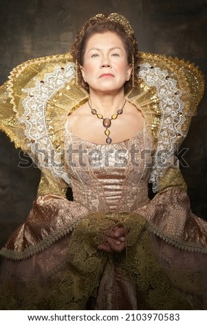 The image of Queen Elizabeth I of the 16th century. Historical reconstruction.High quality photo Royalty-Free Stock Photo #2103970583
